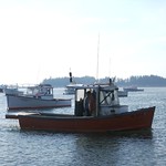 "Working lobster boat, Beals Island, Maine" by robposse is licensed under CC BY 2.0.